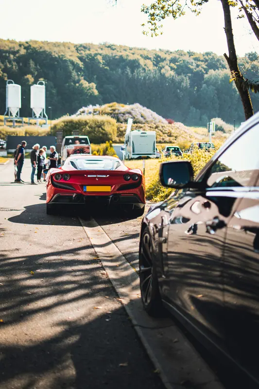 A red Ferrari at a tour stop