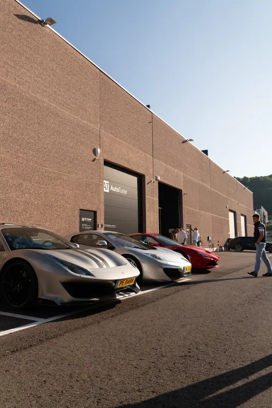 Cars parked outside at a tour stop