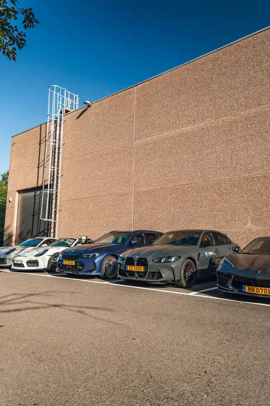 A row of cars at a tour stop