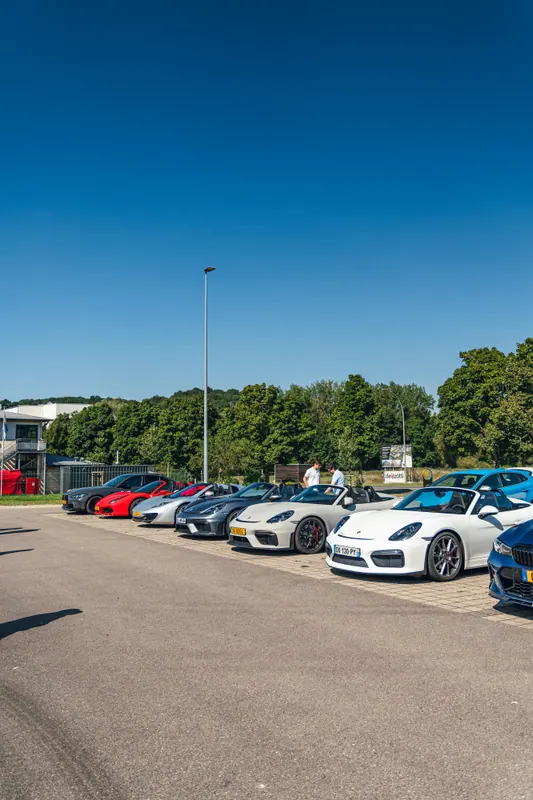 Cars gathered in the sunshine