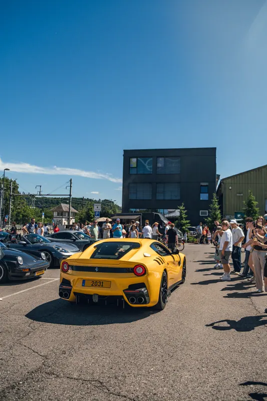 A yellow Ferrari in the event lineup